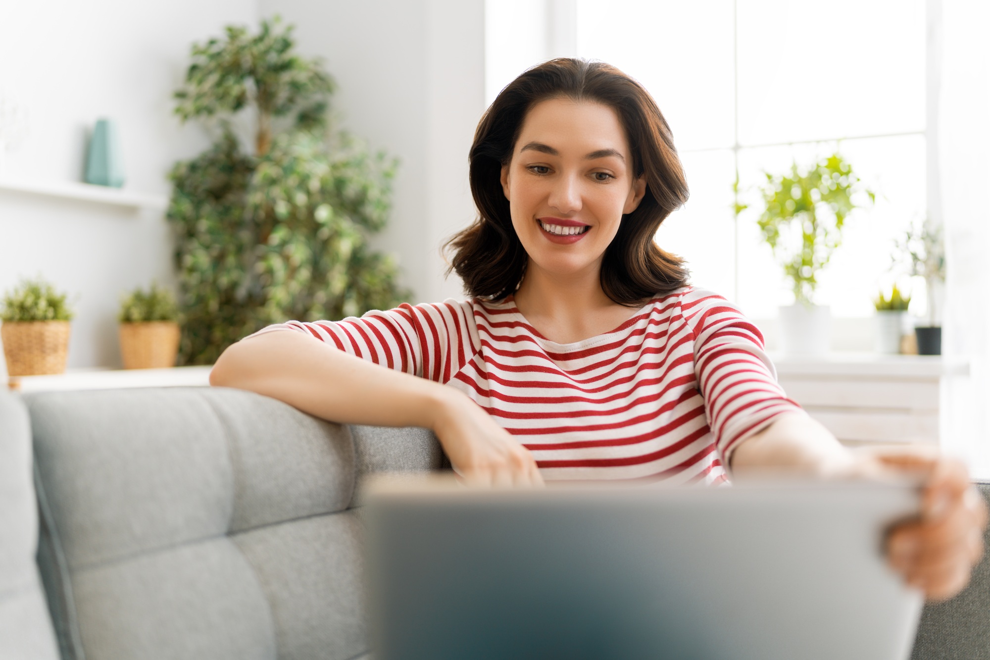 Young woman is chatting with somebody.
