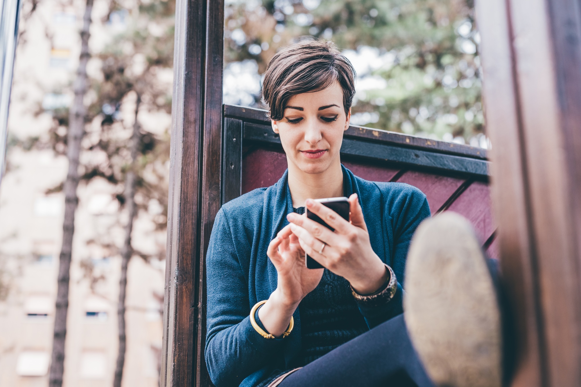 Young woman outdoor using smartphone